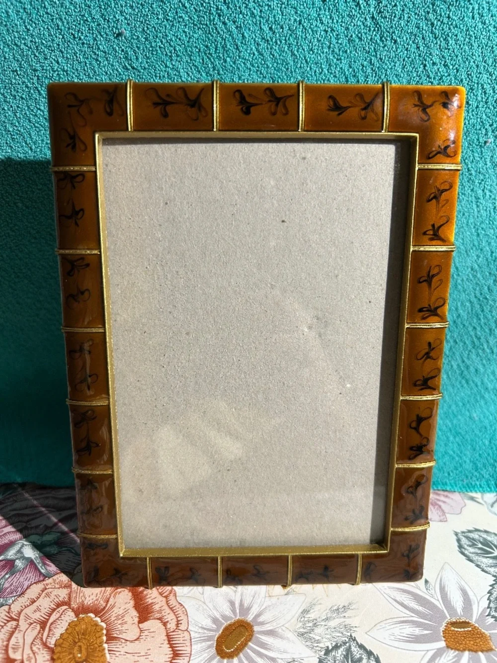 This Ashleigh Manor faux tortoiseshell and gold metal